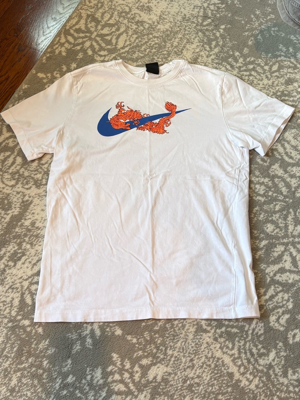 Nike White Short-Sleeve Tee with Blue Swoosh and Orange Dragon
